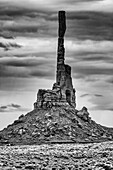 The Totem Pole on a cloudy day in the Monument Valley Navajo Tribal Park in Arizona.