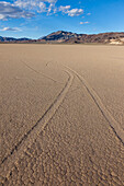 Tracks of sailing stones on the Racetrack Playa in Death Valley National Park in the Mojave Desert, California.