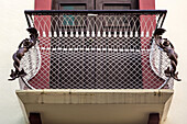 Cast mermaid statues on the balcony in the old Colonial City of Santo Domingo, Dominican Republic. A UNESCO World Heritage Site in the Dominican Republic.