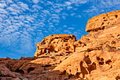 Unnamed natural arches in the eroded Aztec sandstone of Valley of Fire State Park in Nevada.