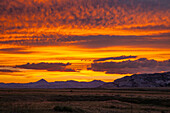 Colorful clouds at sunset over the Granite Mountains in Wyoming, U.S.A.
