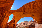 Spiderweb Arch, a large natural double arch in the Monument Valley Navajo Tribal Park in Arizona.