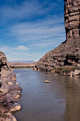 River rafting on the Rio Grande River in Santa Elena Canyon in Big Bend National Park with Mexico at right.