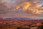 Colorful stormy clouds at sunrise in Monument Valley Navajo Tribal Park in Arizona. View from Hunt's Mesa.