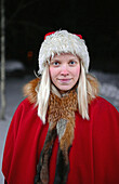 Cute blonde woman dressed as an elf. Lapland, Finland