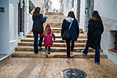 Family walks in the streets of Altea, Alicate, Spain