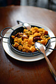 Fried breadcrumbs with chorizo in restaurant, Granada, Spain