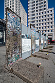 A section of the famous Berlin Walll being displayed in potsdamer platz in Berlin Germany