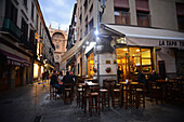 Tapas bars at night in Granada, Spain