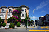 Purple flowers covering building in Lombard Street, San Francisco.