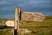 Signpost warning on a field in Yorkshire Dales England