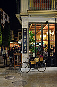 Tapas bars at night in Granada, Spain
