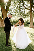 Bride and groom in park