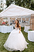 Smiling bride at wedding reception