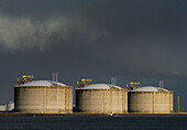 Netherlands, Rotterdam, Liquefied Natural Gas (LNG) storage tanks at harbour