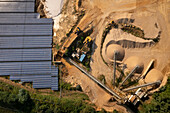 Germany, Herzogenrath, Overhead view of solar panels at sand mine