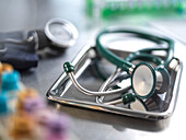 Close-up of stethoscope on metal tray