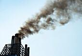 Smoke rising from industrial building