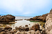 Italy, Sicily, Tidal pool and sea