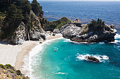 A Remote Beach Along The Rugged Coastline; California, United States Of America