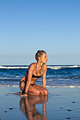 Young Woman In A Bikini At Seven Mile Beach, Byron Bay; New South Wales, Australia