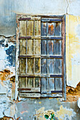 Worn Wooden Shutters On A Cracked And Dilapidated Building; Beirut, Lebanon