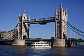 Tower Bridge And River Boat; London, England