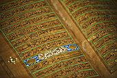 Intricate Text Of An Old Koran At Brunei's Dar Al-Salam's Islamic Museum; Bandar Seri Begawan, Brunei
