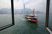 Star Ferry Arriving At Tsim Sha Tsui Terminal; Hong Kong