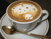 Close Up Of A Cappuccino With Cute Bear Design In The Foam; Kyoto, Japan
