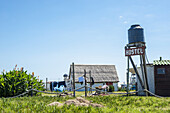 Water Tower And Sign For A Hostel; Cabo Polonio, Uruguay