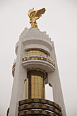 Gold Statue Of Turkmenbashi On Top Of Monument Of Neutrality; Ashgabat, Turkmenistan