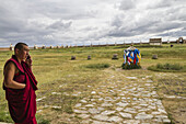 Buddhist Monk On A Mobile Phone By The Larviran Temple At The Erdene Zuu Monastery, Karakorum (Kharkhorin), Ã–vÃ¶rkhangai Province, Mongolia
