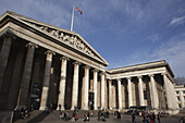 The Neo-Classical Facade Of The British Museum With The Union Jack Flag Flying; London, England