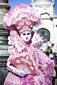 A Woman In A Glamorous Pink Costume; Venice, Italy