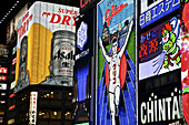 Colourful, Illuminated Billboards On Buildings At Nighttime; Osaka, Japan