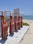 Showers With Soda Pop Advertisements On Coco Beach; Dar Es Salaam, Tanzania
