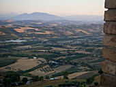 View of the Aso Valley and the Sibillini Mountain range from a vantage point; Moresco, Marche region, Italy