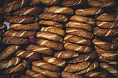 Close-up of a stack of baked goods for sale; Simit, Istanbul, Turkey