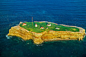 Aerial view of a gannet rookery on the easternmost point in Quebec; Bird Rock, Quebec, Canada