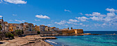 Town of Trapani and view of the old town by the sea with the Fortification Bastione Conca; Trapani, Sicily, Italy