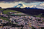 View of the city of Quito from El Panecillo (from Spanish panecillo small piece of bread, diminutive of pan bread) which is a 200-meter-high hill of volcanic-origin; Quito, Ecuador