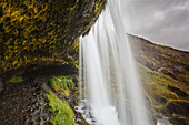 Cascading Hafrafell waterfall in mountains near Stykkisholmur, Snaefellsnes peninsula, western Iceland; Iceland