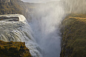 Splashes and mist over Gullfoss Falls in the Golden Circle of Iceland; Iceland