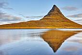 Kirkjufell mountain and it's mirror image in water, near Grundarfjordur, Snaefellsnes, Iceland; Iceland