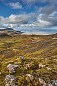 Harsh and rugged landscape along the coast of Iceland, with a view of the north coast from Valafell mountain pass, looking towards Olafsvik, Snaefellsnes peninsula, west coast of Iceland; Iceland