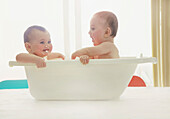 Baby Twins Having a Bath