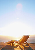 Sun Lounger on Deck at Sunset