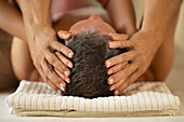 Close up man receiving head massage