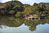 A temple garden and lake in autumn, Kyoto, Honshu, Japan, Asia